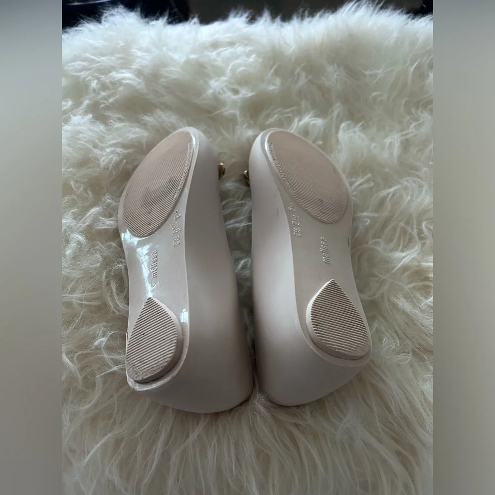 Mini Melissa excellent worn